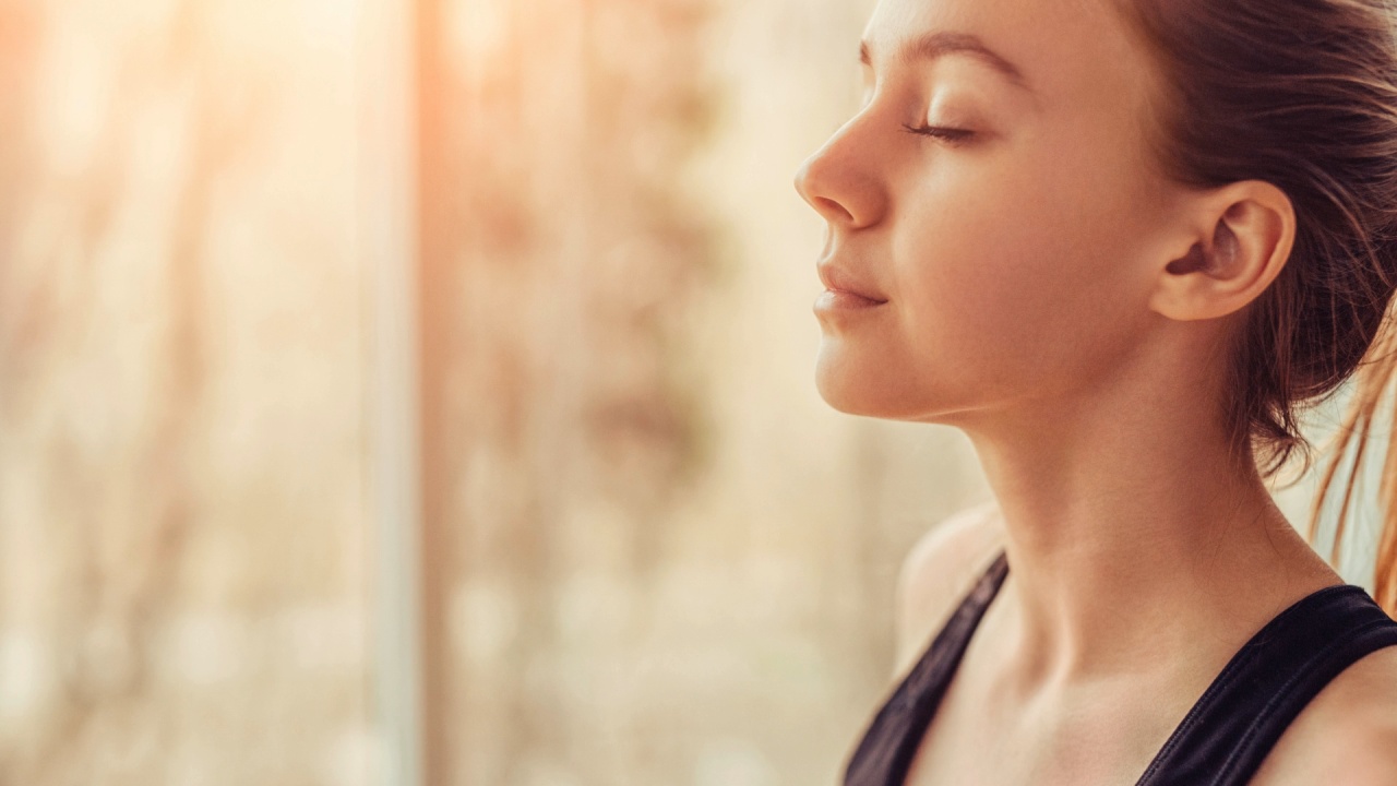 A woman resting with her eyes closed